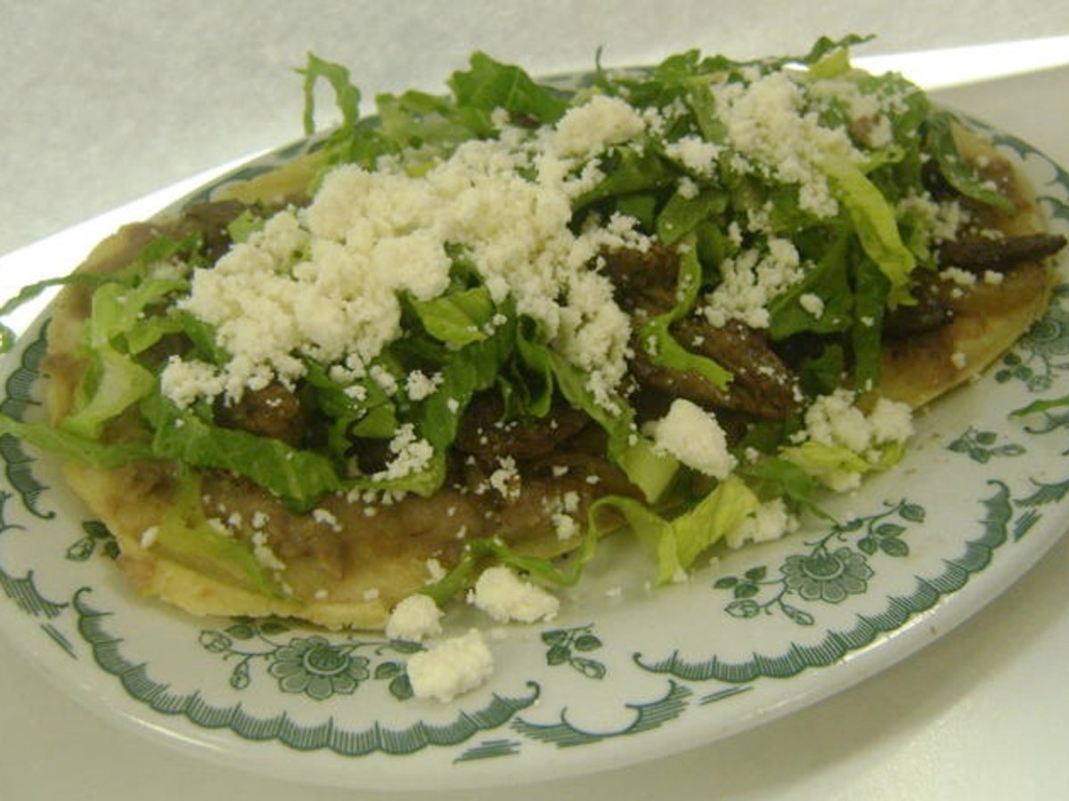 Sope with cecina and queso fresco