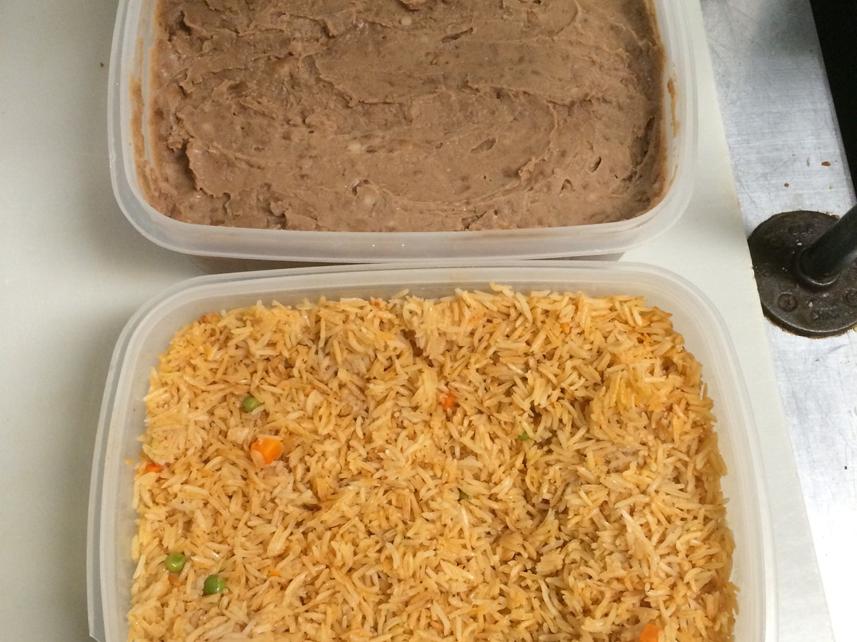 Fresh rice and refried beans by the pound